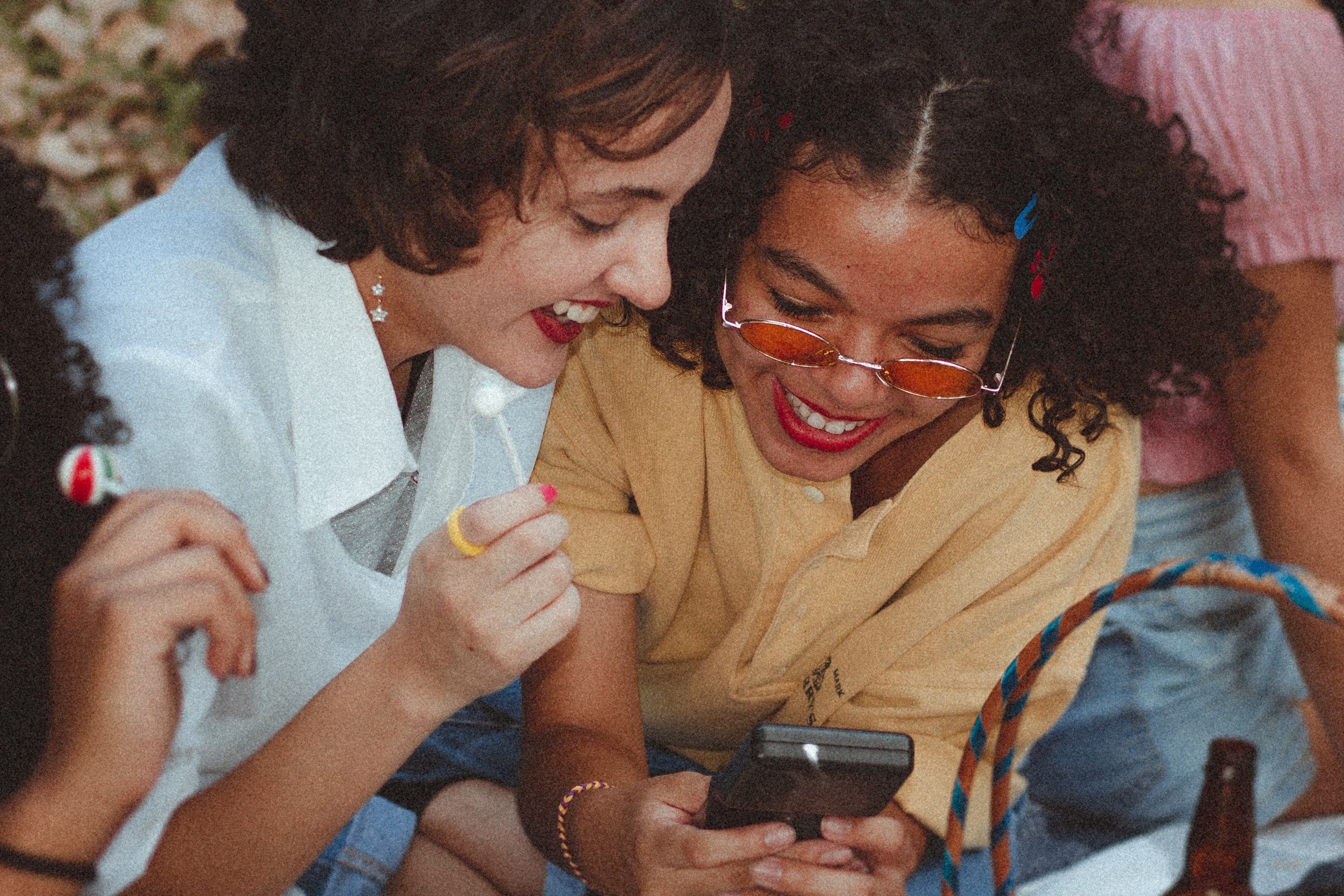 Picture of two women laughing together.